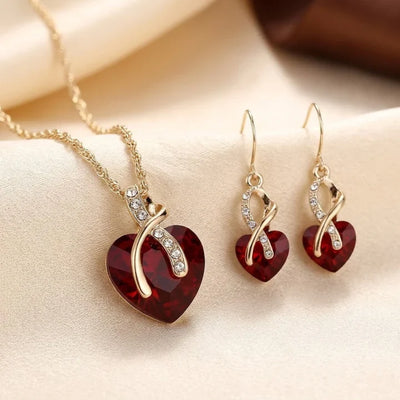 Set de Joyas Corazón Trenzado de Oro con Rubí