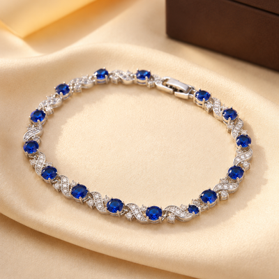 Pulsera de Eslabones Florales de Plata con Zafiro