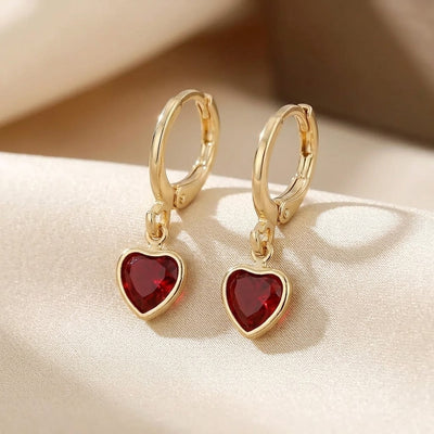 Aretes Colgantes Corazón de Oro con Rubí